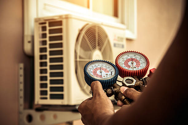 Professional Air Conditioning Service technician working in Valencia, PA
